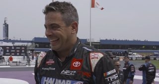 Friesen climbs fence, salutes fans after Michigan win