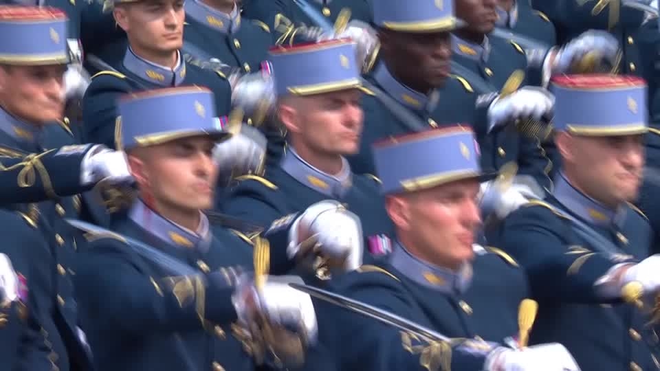 Soldier bleeds, horse falls to ground in France's Bastille Day parade