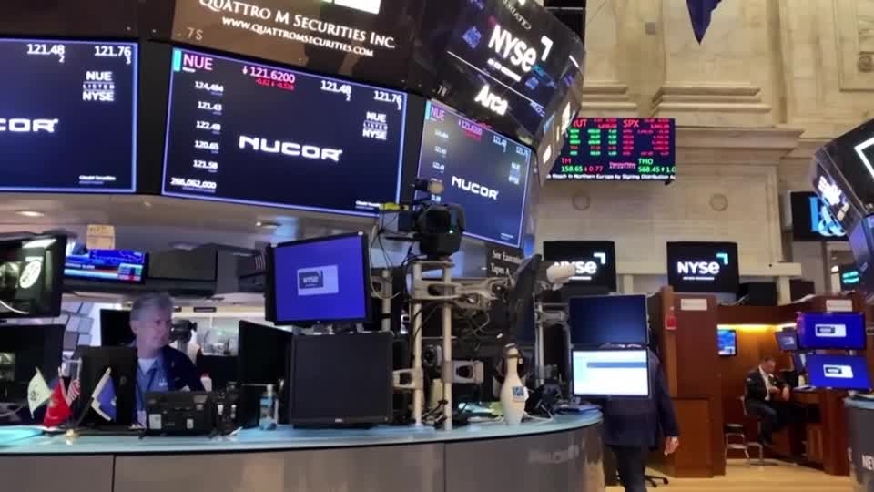 US stocks end higher as investors digest earnings