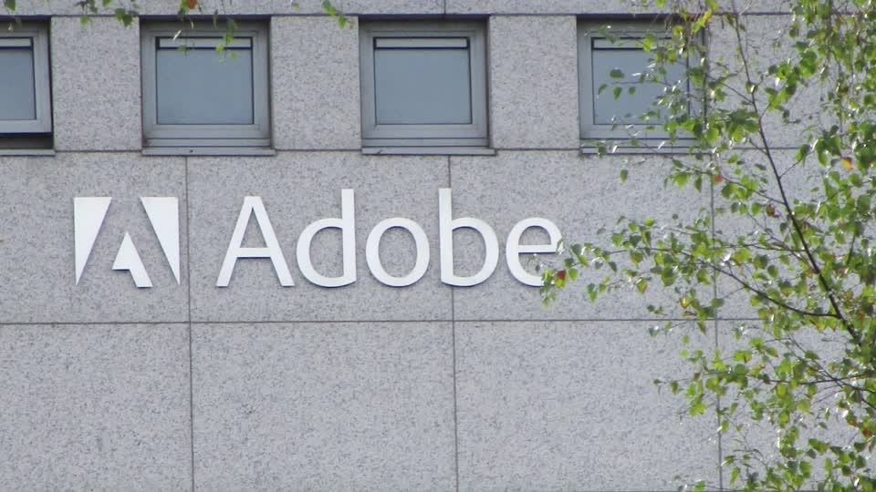 Adobe shares fall, investors skeptical of quicker AI-adoption returns