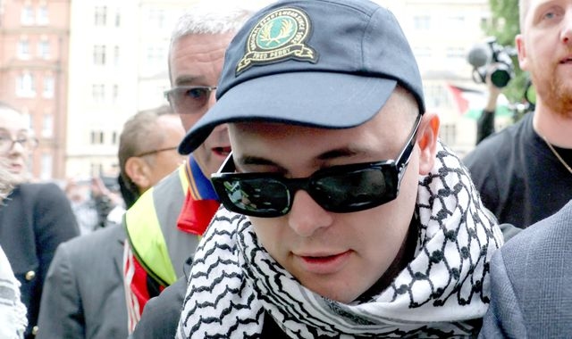 Kneecap rapper greeted by hundreds of supporters at terror charge court hearing