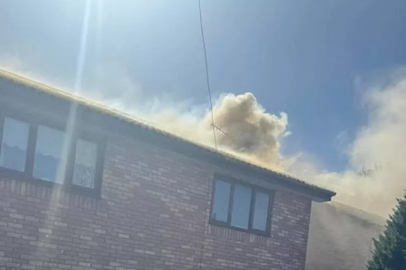 Fire ripped through roof of house so fiercely it forced road closure