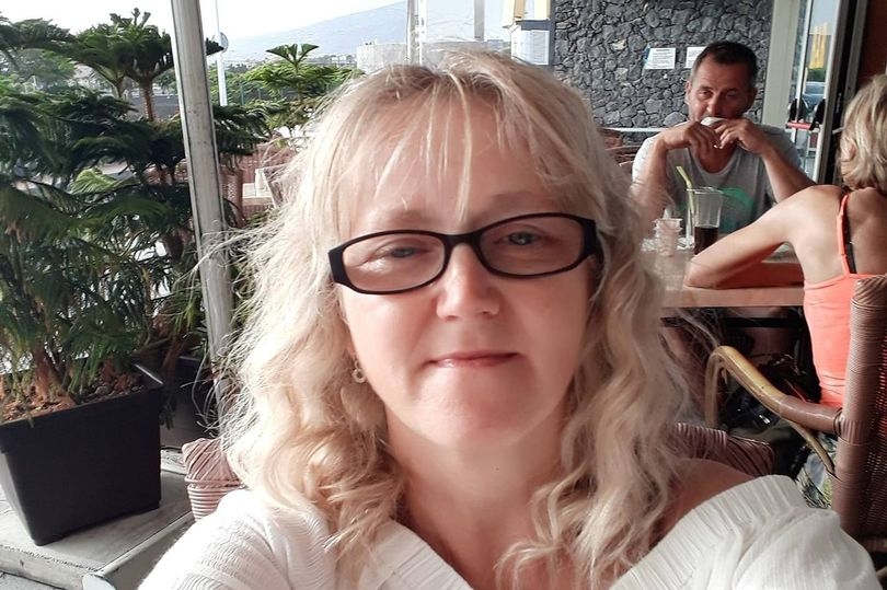 Woman pushed out of car and dragged along road after man creeps up behind her
