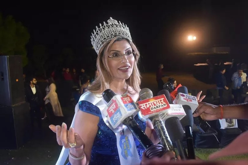 Professor scoops hat-trick of beauty queen titles