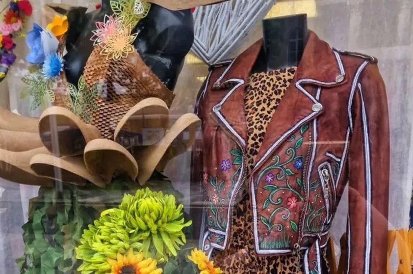 Grey-haired woman in her 50s caught on CCTV taking 'one of a kind' jacket from charity shop