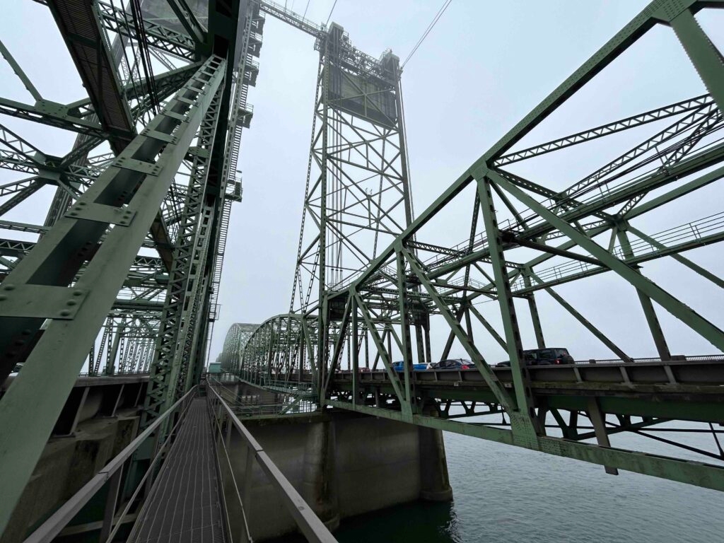 Tolling delay on I-5 bridge could mean higher rates for Washington and Oregon drivers.
