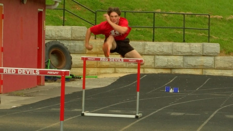 Halls junior runs, throws and jumps into Red Devils record books
