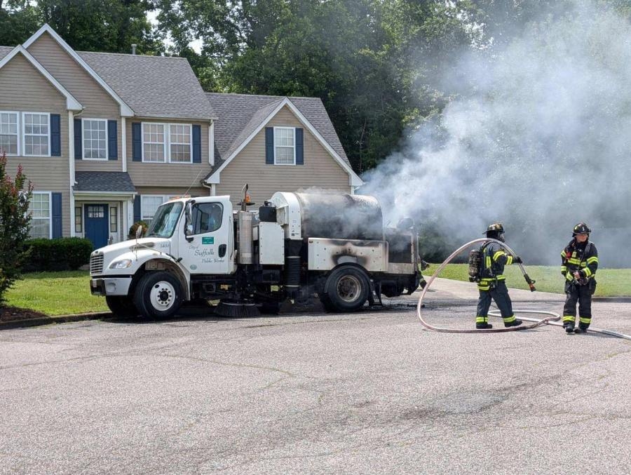 Street sweeper catches on fire in Suffolk neighborhood
