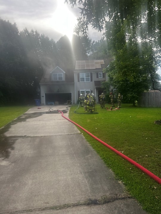 Family of 6, 2 dogs, displaced after house fire