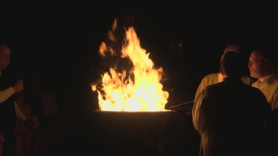Parishioners pack local church for Easter Vigil