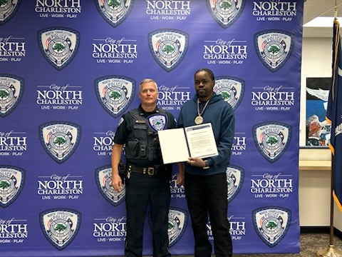Local police department honors man who saved woman's life on I-26 overpass