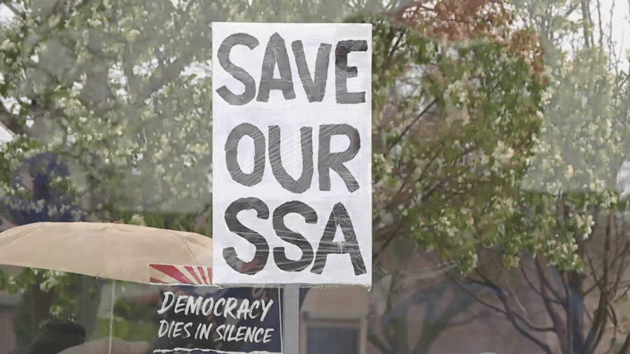 Johnson County, Kansas residents rally in protest against federal cuts