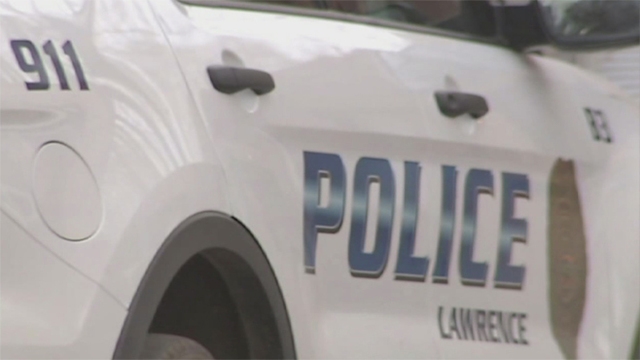 Lawrence police searching for person accused of stabbing elderly woman