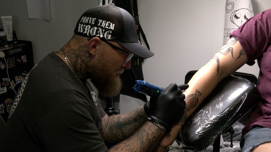 Owensboro tattoo artist uses 'sacred marks' to impact customers