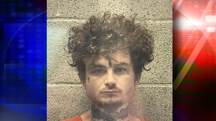 Henderson robbery suspect at large