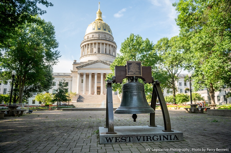 Morrisey signs session's key foster care bill, vetoes other measure meant to help system in crisis