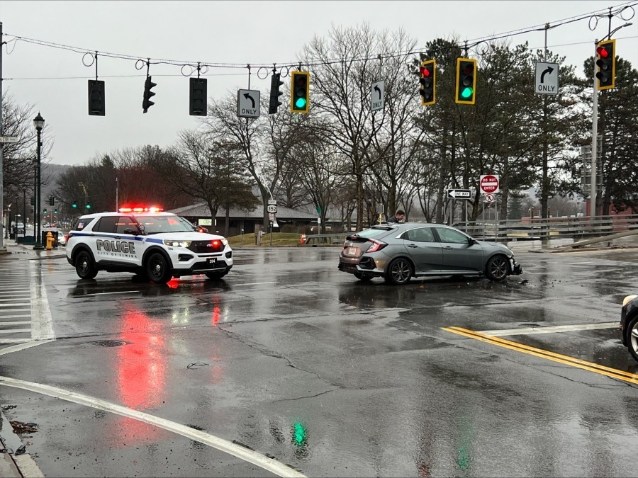 Two vehicle crash blocks busy intersection in Elmira