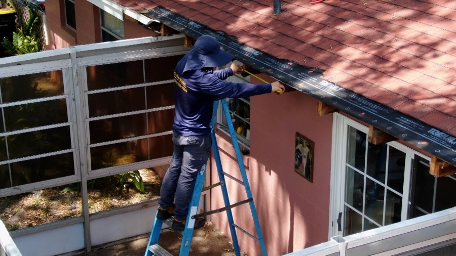 Roofing company repairs Winter Haven army vet's lanai for free