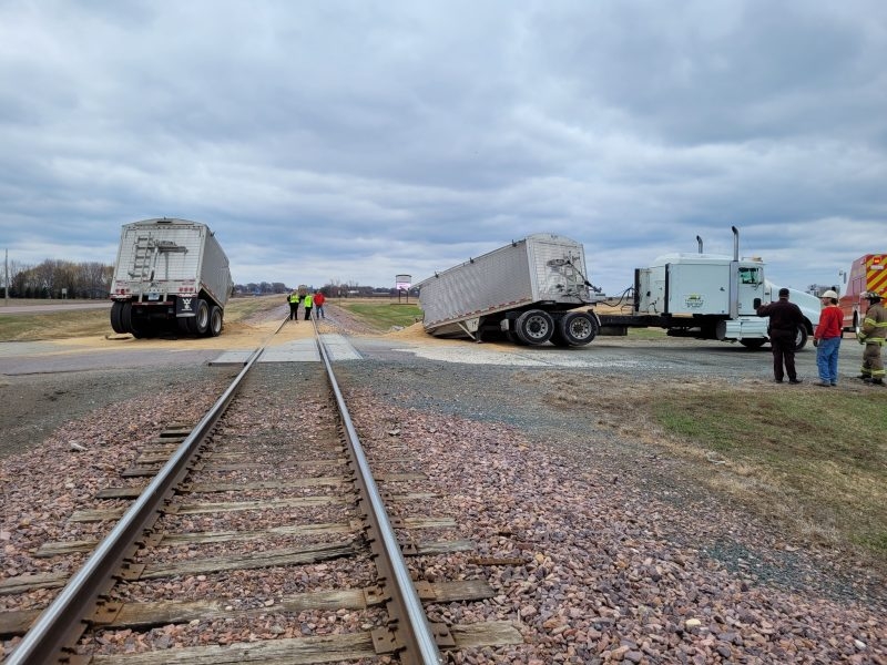 WATCH: Semi-trailer attempting to turn into business split in half by train