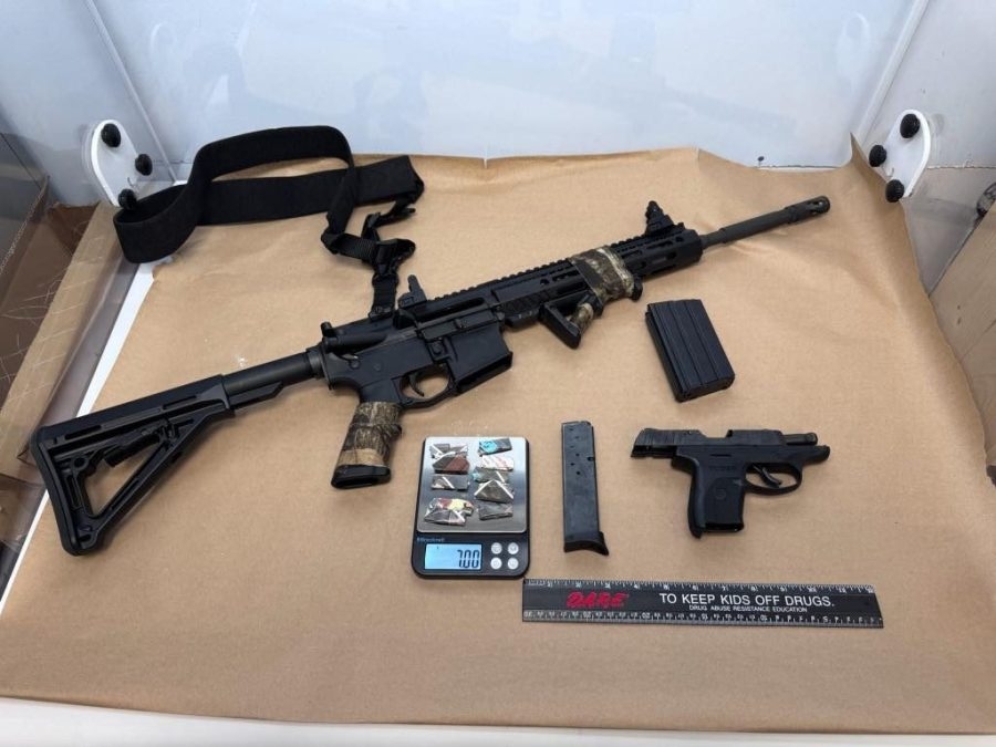Menominee Tribal Police seize multiple drugs & loaded guns including assault rifle from speeding driver
