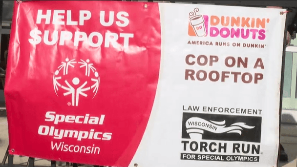 Menasha cops and community rally for Special Olympics at Dunkin'
