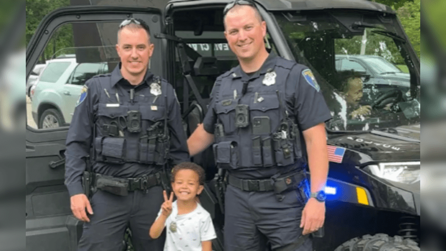 Police in Wisconsin surprise five-year-old with visit during police-themed birthday