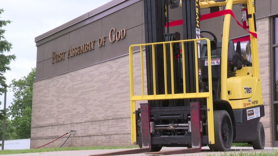 Fairchild Equipment delivers refurbished forklift to church in Green Bay to help serve families in need