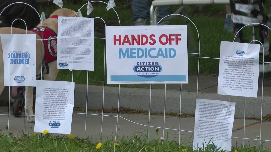 Groups gather outside Senator Ron Johnson's Oshkosh office to voice concerns over possible Medicaid & Medicare cuts