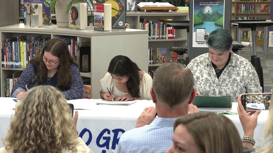 Green Bay West High School students celebrate ‘signing day' with scholarships to help pay for college