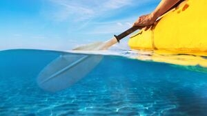 Beach safety jetski rescues overturned canoer in Volusia County