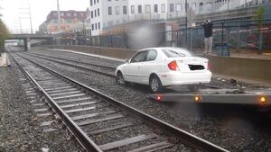 Driver uninjured after car ends up on MBTA train tracks in Chelsea