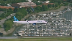 Aborted JetBlue landing not due to another plane; FAA, airline blame instability for missed approach