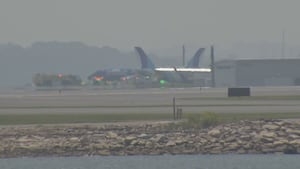 Ground stop at Boston's Logan Airport after plane goes off runway while landing