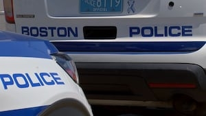 Dorchester man arrested on firearm, drug charges following search warrant