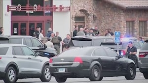 Person of interest in New England mall shooting that wounded 5 people detained, police say