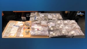 Drugs, guns, cash: Two men arrested after person shot, house break in Boston