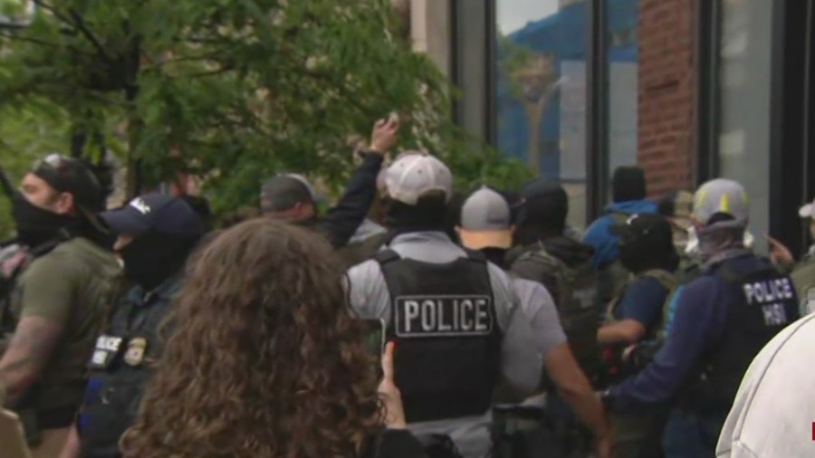 Reported arrest prompts crowd activity at immigration supervision building in Chicago