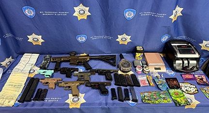 Drugs, stolen vehicles and illegal firearms allegedly found at Slidell home