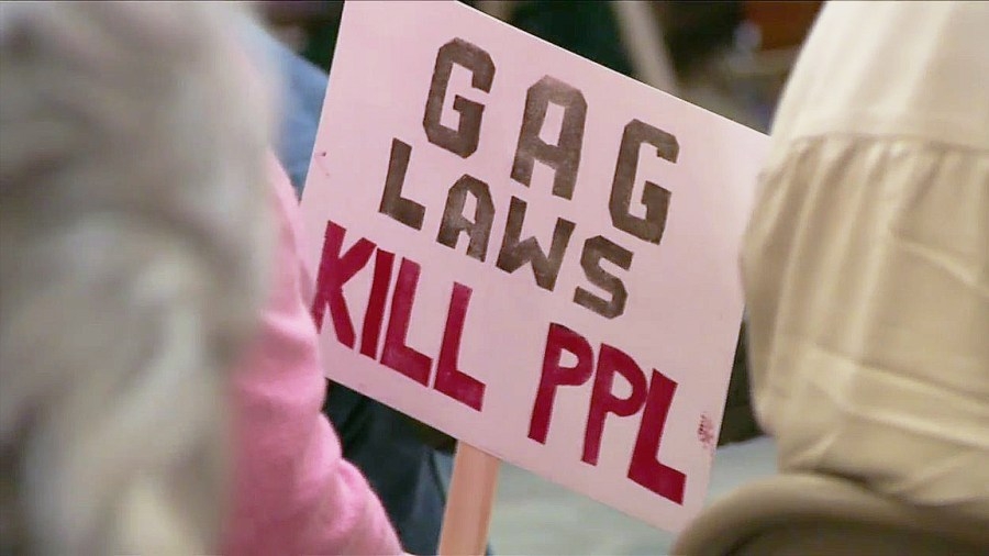 Demonstrators oppose Iowa bill to protect pesticide companies