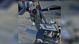 Police looking for man accused of using fake ID card to withdraw from account