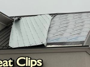 Strong winds partially pull roof off area Great Clips, cause damage across Miami Valley