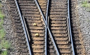 Driver seriously injured after train hits dump truck, OSHP says