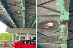 Hole in the road causes lane closures on overpass above busy interstate