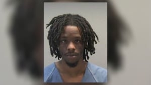 Police searching for man accused of trying to rob someone at local bank