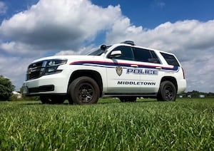 Officer hurt after cruiser gets hit by stolen vehicle