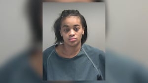 Woman charged after victim shows up at hospital with gunshot wound issues plea