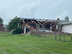 EF1 tornado tears roof off home, narrowly missing family