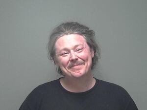 Suspected drunk driver rams police cruisers, knocks over utility pole during chase