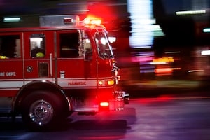 Fire crews work to put out house fire near Indian Lake