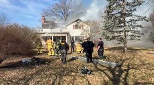 Smoke, flames seen coming from Clark County house